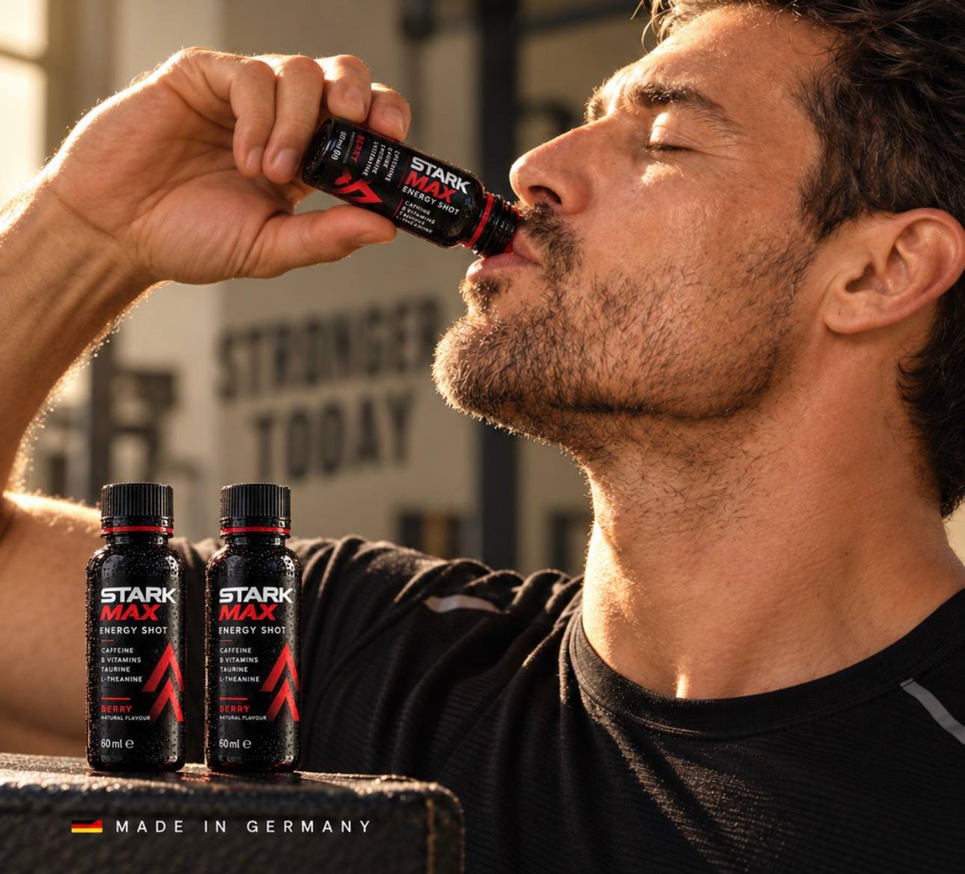 Athlete drinking a STARK MAX Energy Shot before training